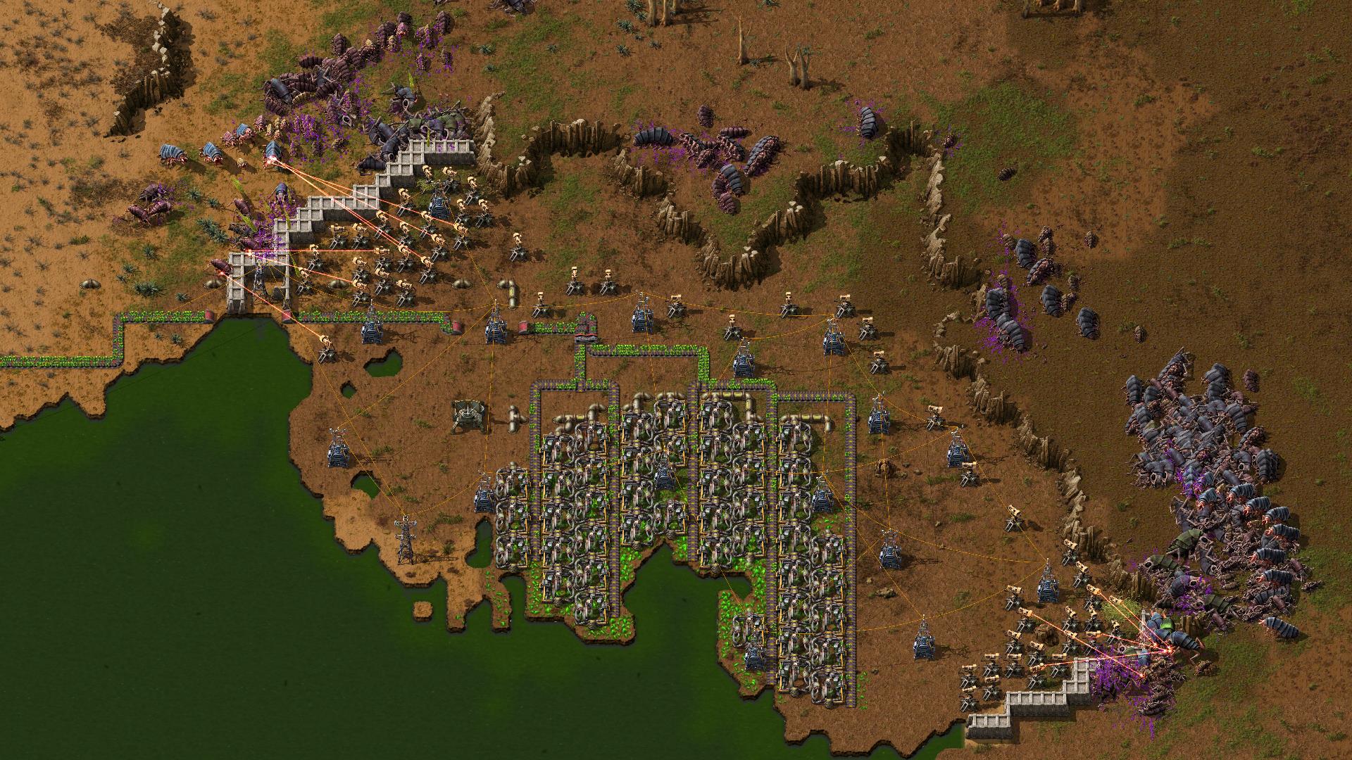 ウラン鉱床の採掘機にパイプを接続したFactorioの採掘拠点