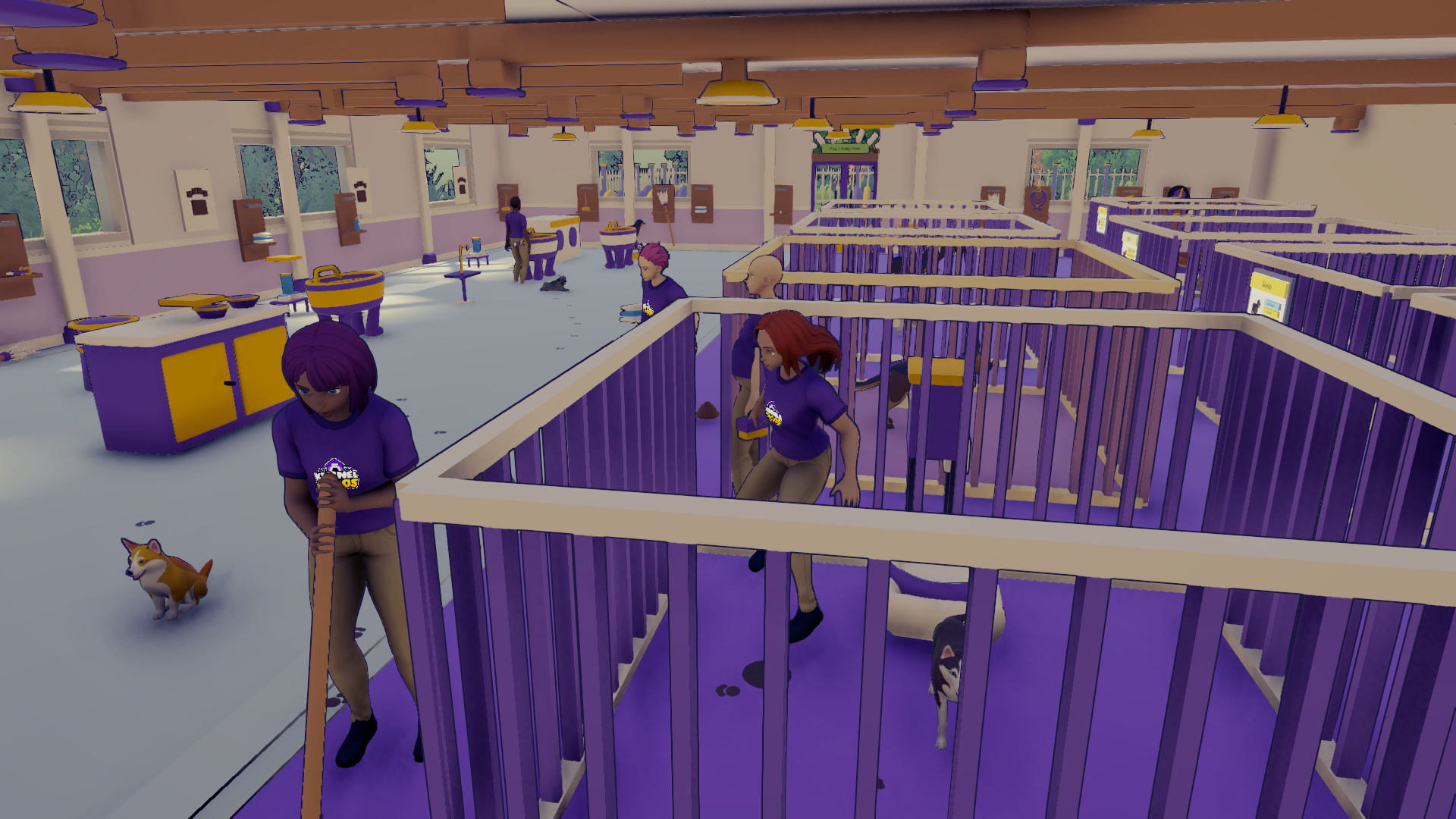 Kennel Chaosの犬舎と洗い場が並ぶ施設内で、複数のスタッフが作業している公式ゲーム画面