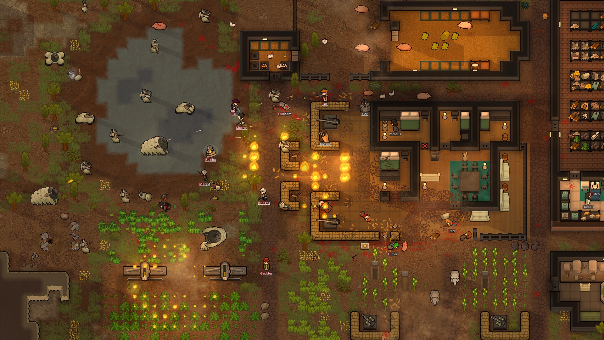 RimWorldの畑と明かりのついた作業場や住居