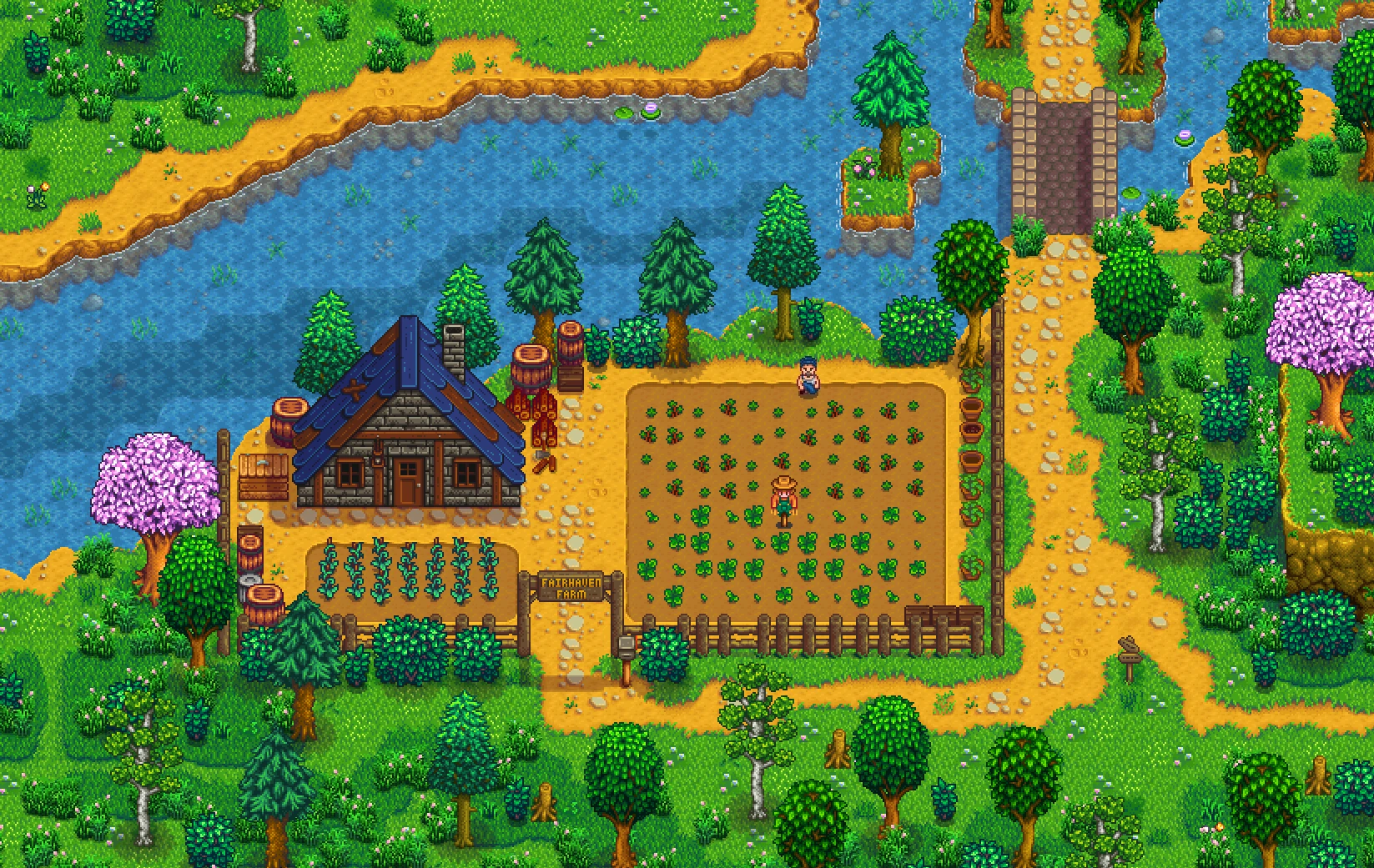 川沿いに家と畑があるSVEのFairhaven Farm