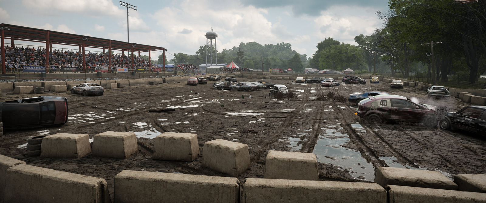 Wreckfest 2のHogtown Arena。ぬかるんだ会場に多数の車両が集まり、衝突や横転が起きている。